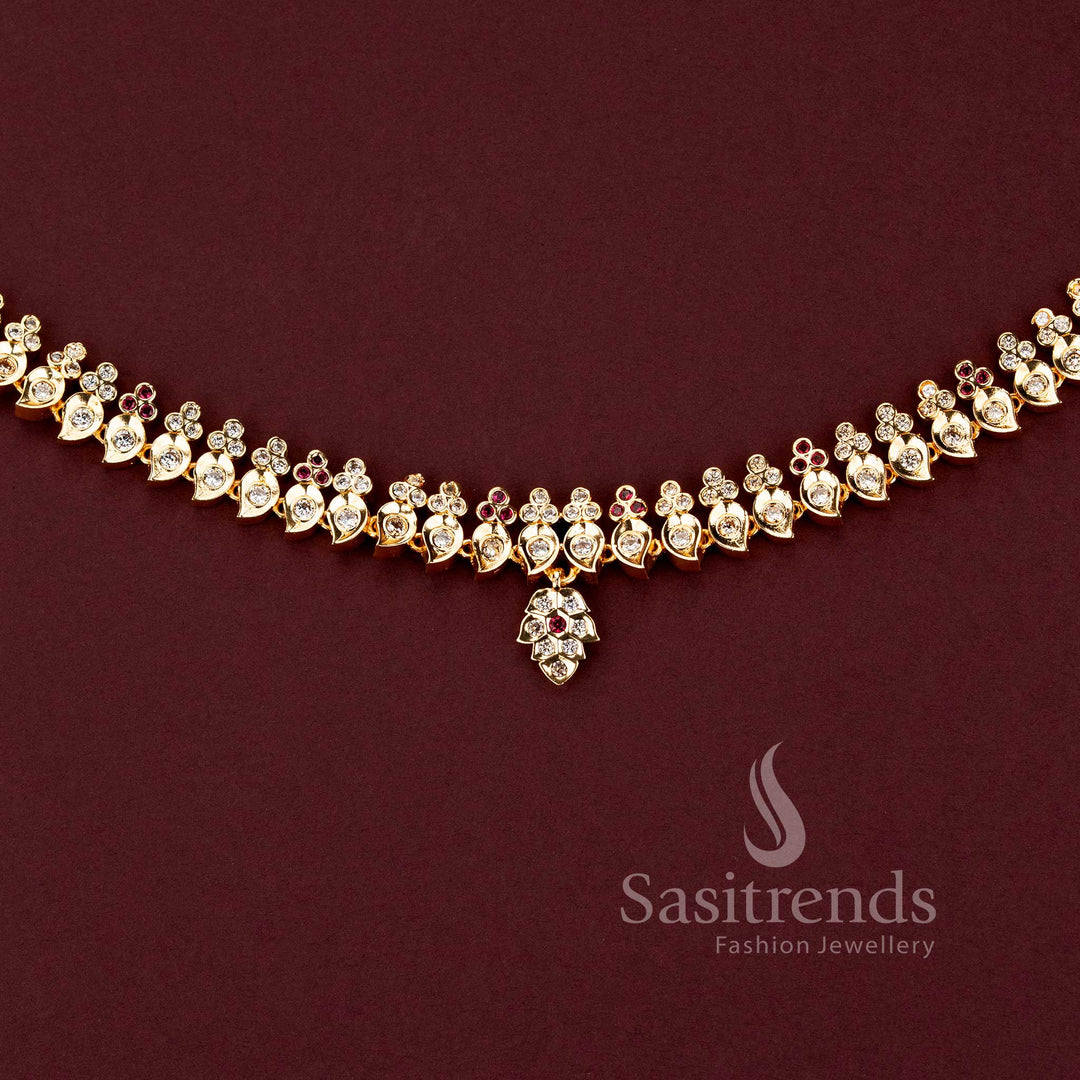 Impon micro gold plated mango motif bridal hipbelt with a traditional white ruby-stone pendant by Sasitrends.