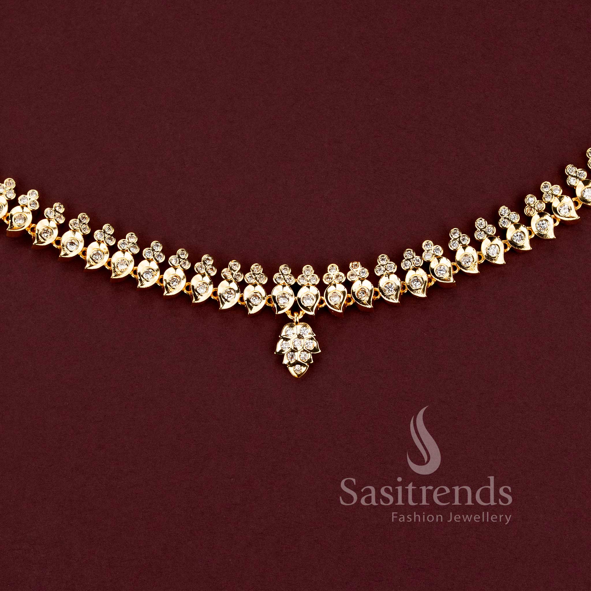 Impon micro gold plated mango motif bridal hipbelt with a traditional multi-stone pendant by Sasitrends.
