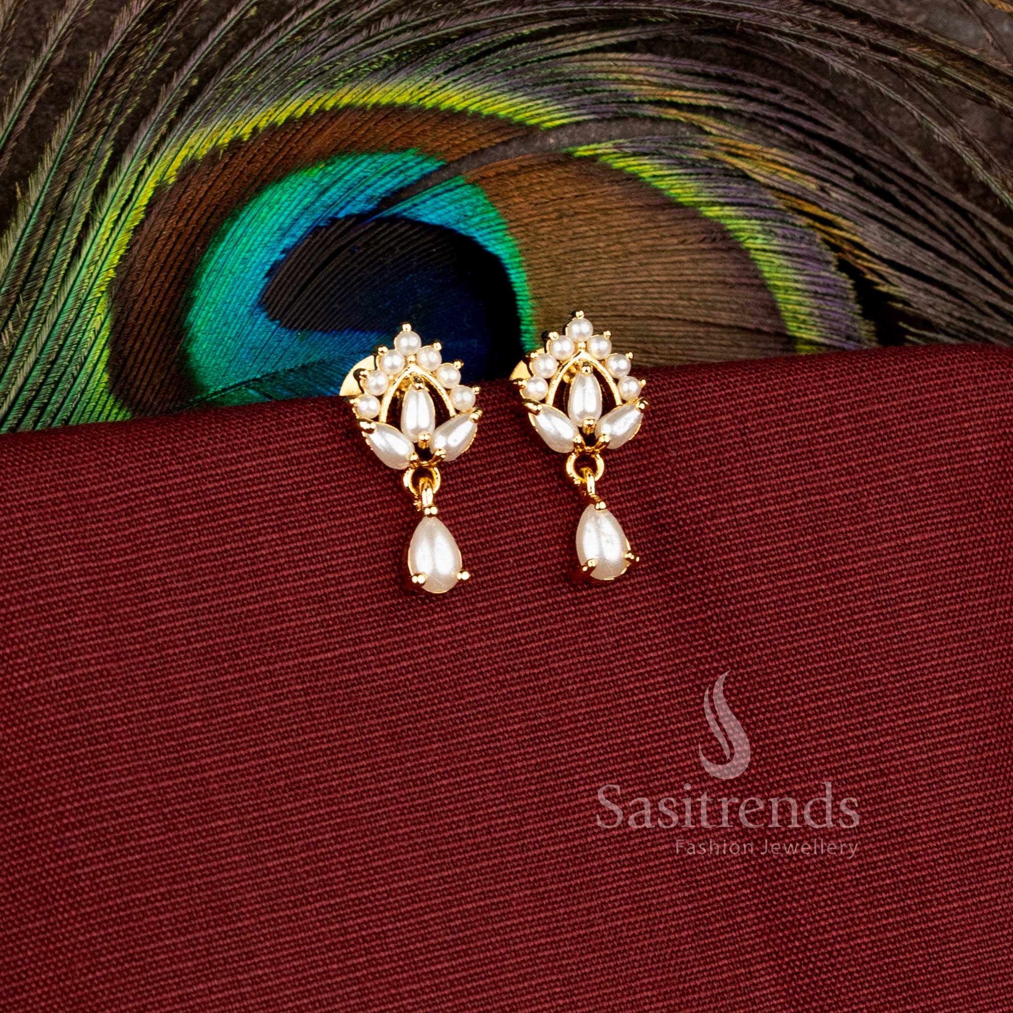 Traditional floral design earrings with hanging drop pattern and sparkling AD stones - Sasitrends