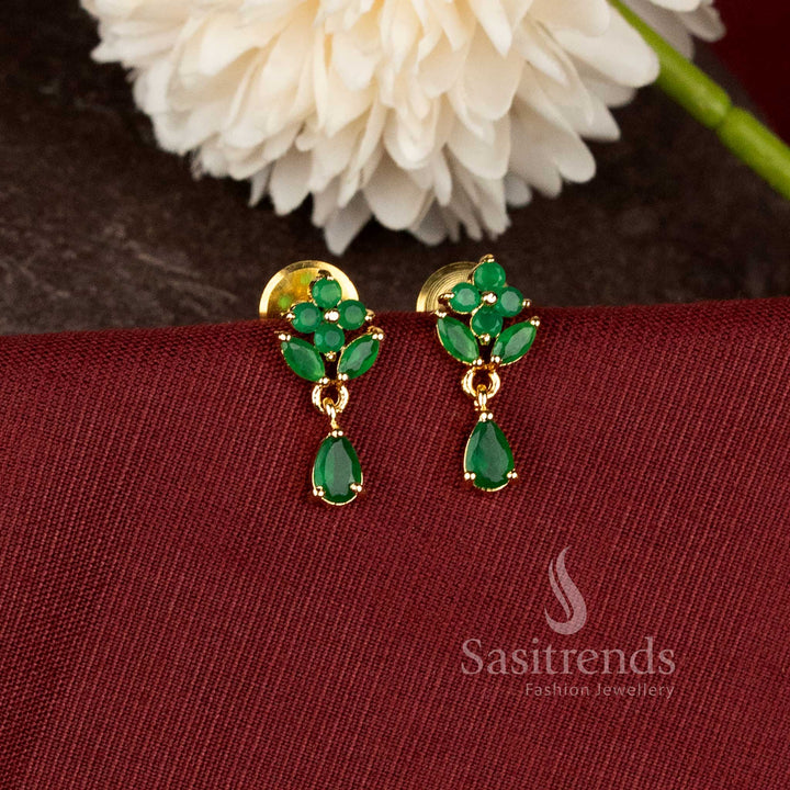 Traditional party wear teardrop earrings with green stone floral design and rich real gold look finish - Sasitrends