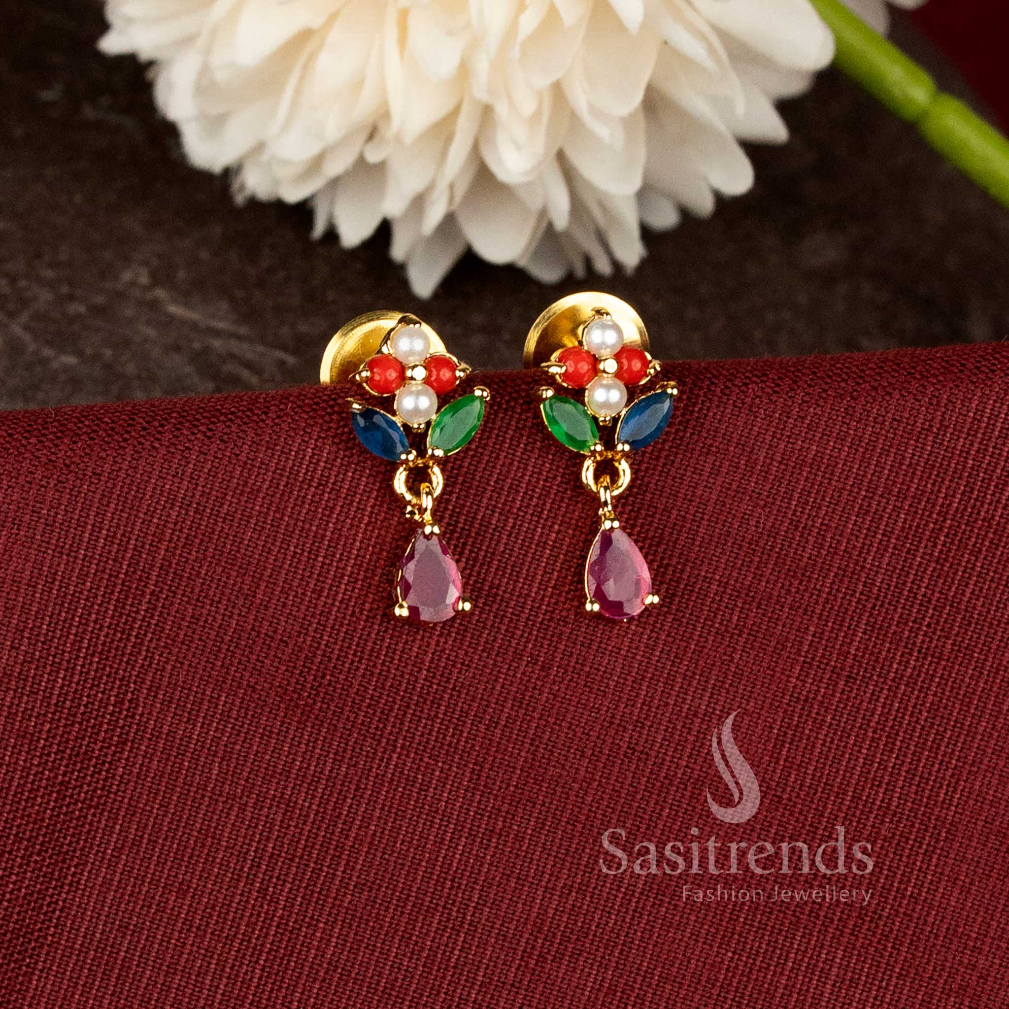 Traditional teardrop earrings with ad stone floral design and rich real gold look finish - Sasitrends