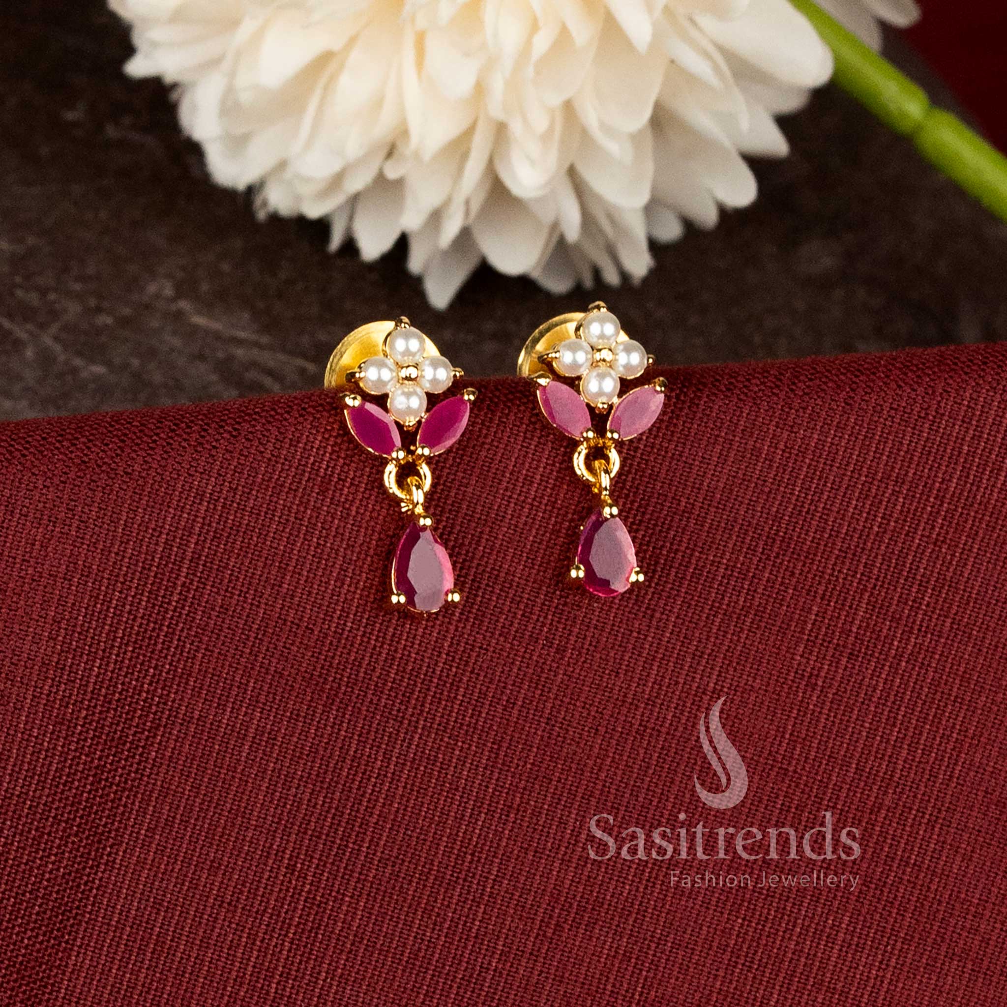 Traditional teardrop earrings with ad stone floral design and rich real gold look finish - Sasitrends