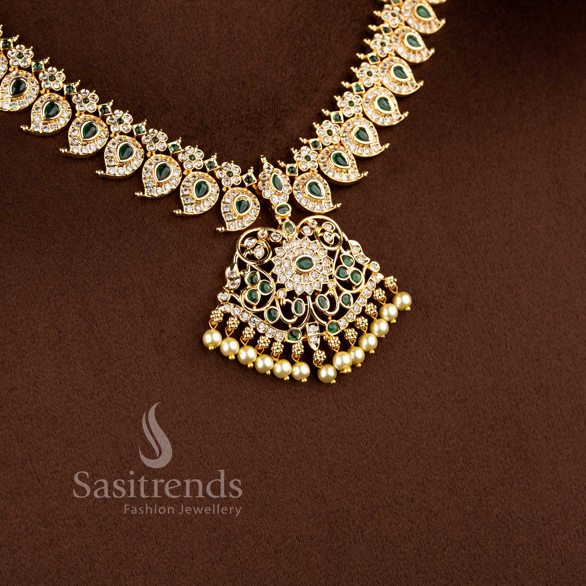 Traditional mango motif AD necklace set with floral detailing and grand pendant design - Sasitrends