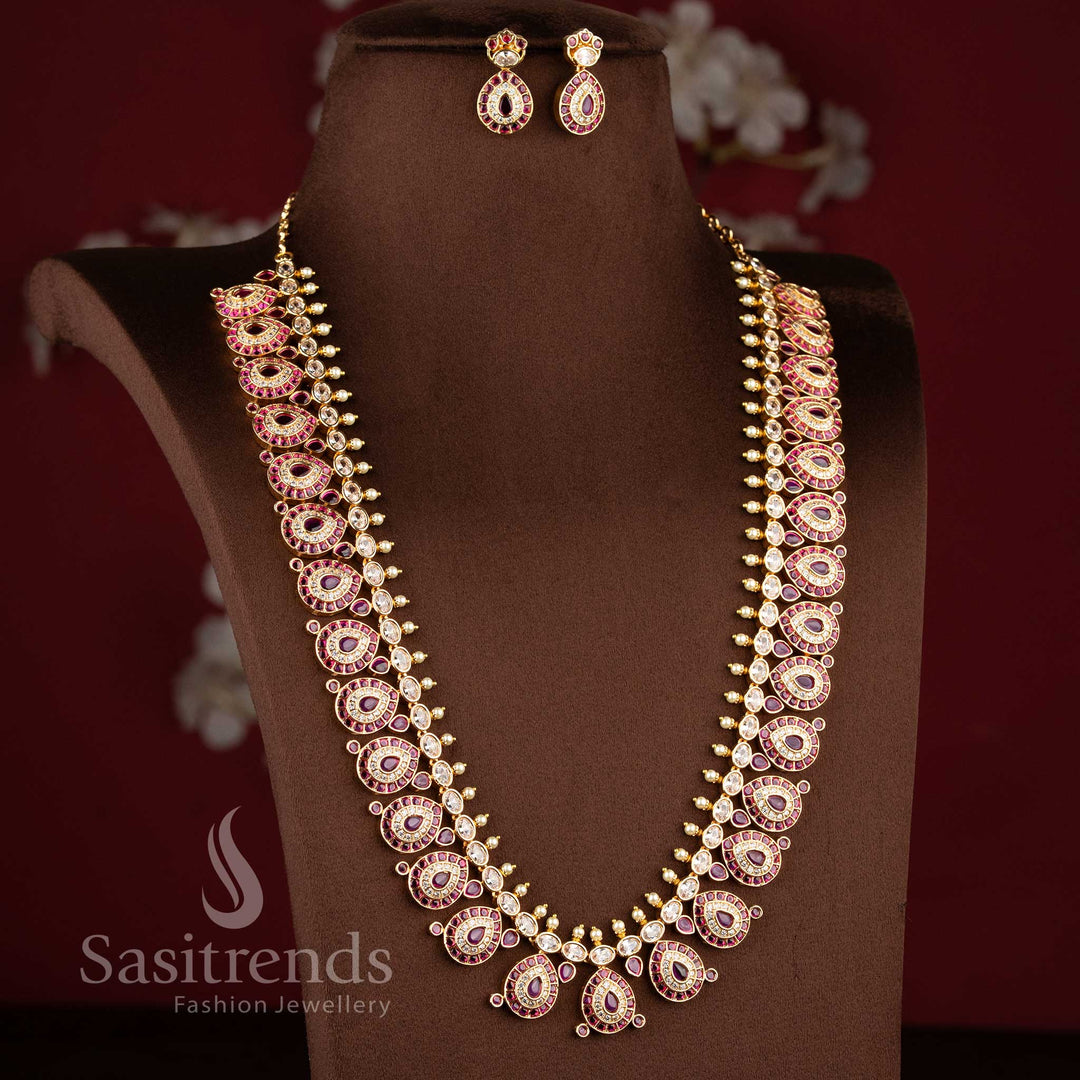 Grand micro gold plated tear drop motif White ruby long necklace combo set with matching earrings by Sasitrends.