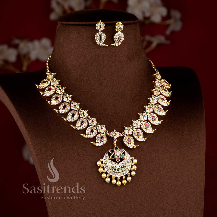 Traditional micro gold plated manga malai short necklace with a multi stone-studded crescent chandbali pendant by Sasitrends.
