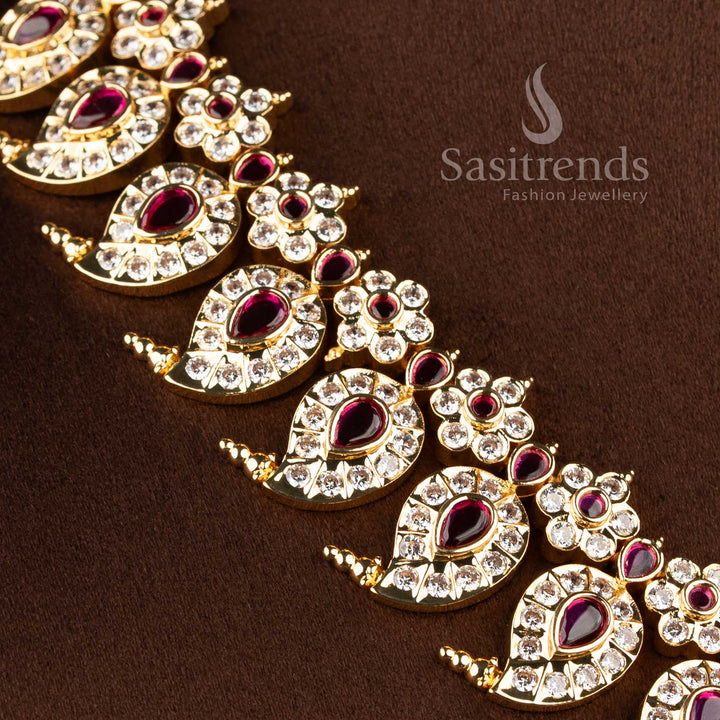 Real gold look wedding wear short necklace showcasing a pearl drop floral blossom centerpiece.