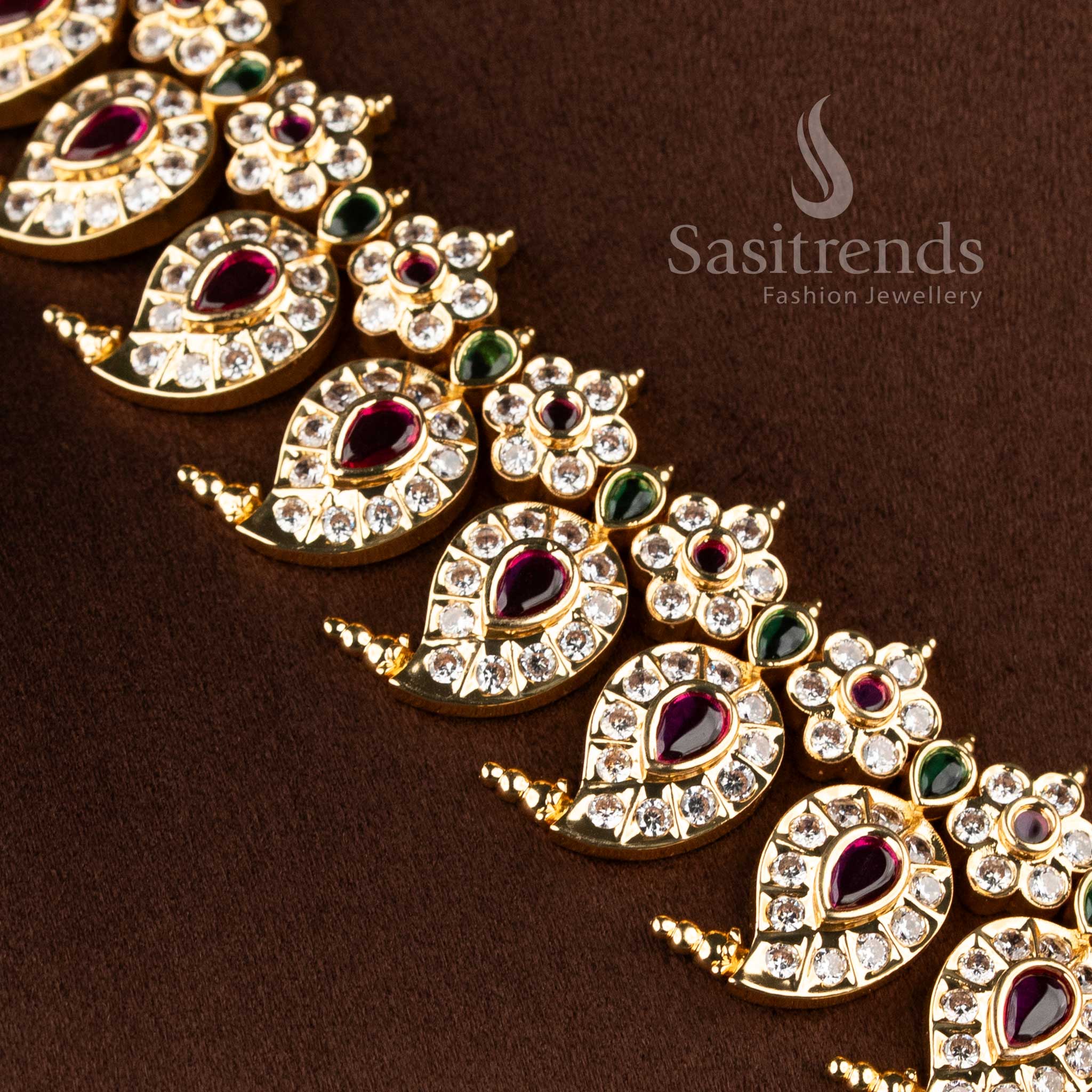 Real gold look wedding wear short necklace showcasing a pearl drop floral blossom centerpiece.