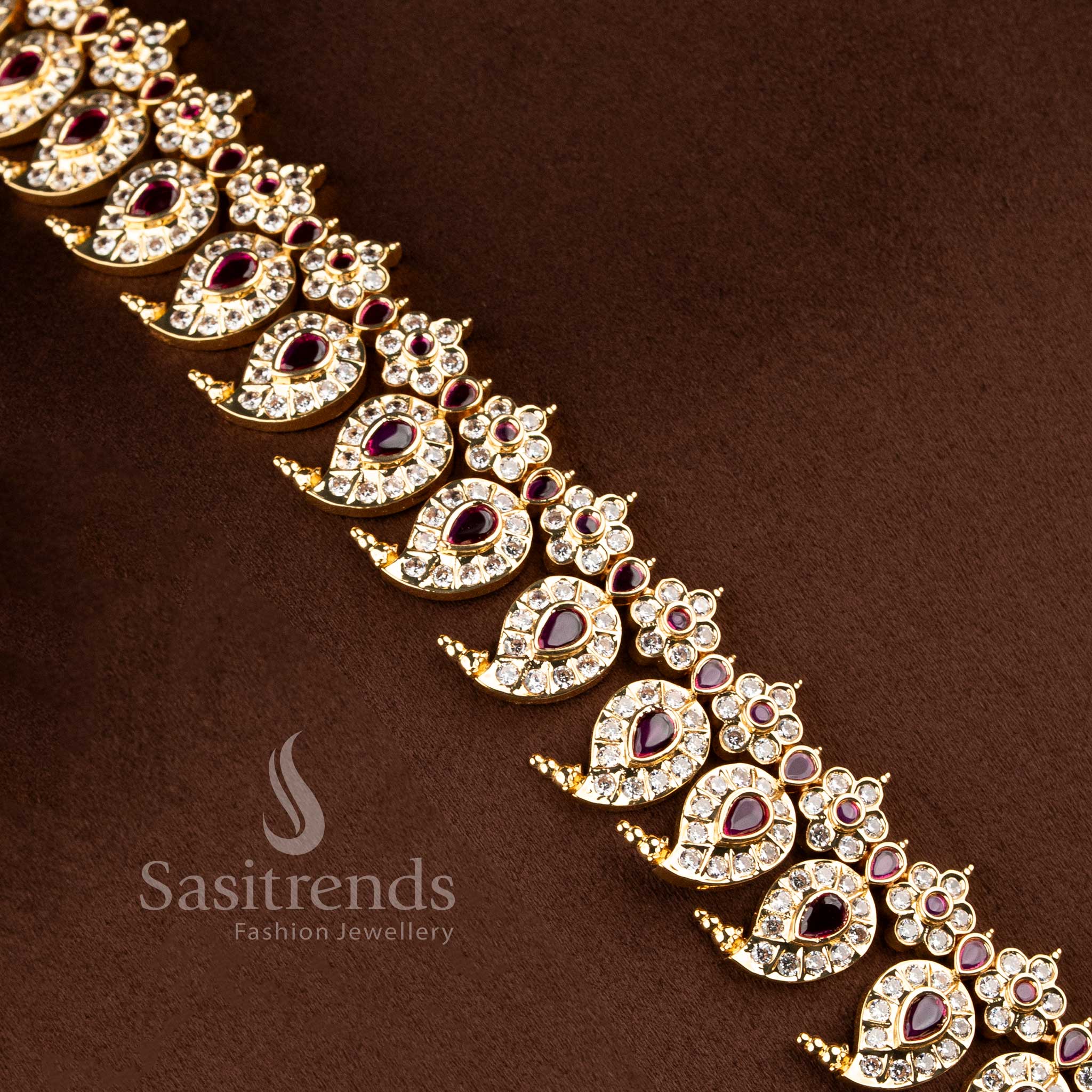 Traditional micro gold plated manga malai short necklace with a stone-studded crescent chandbali pendant by Sasitrends.
