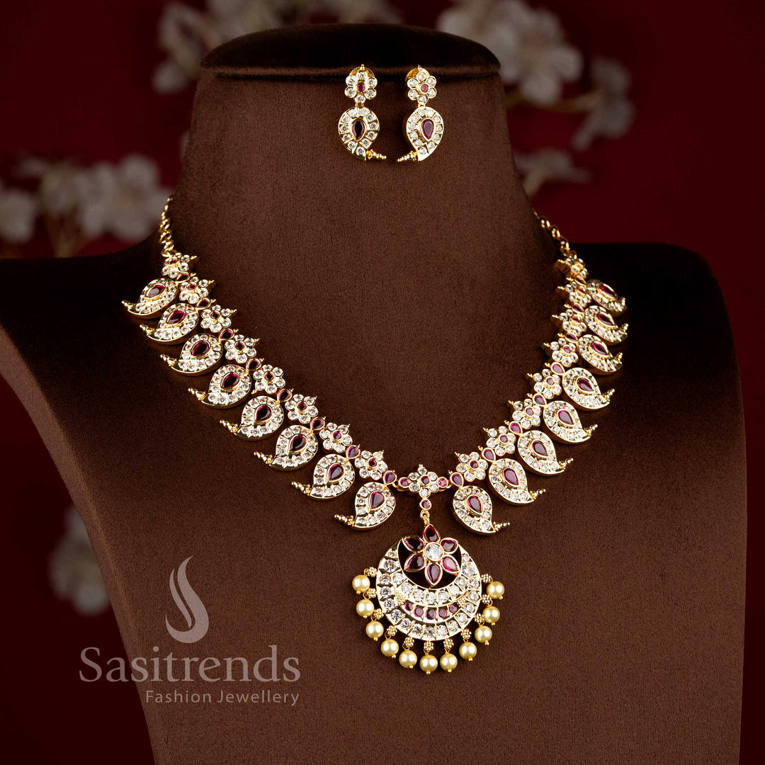 Festive wear south indian style paisley neckpiece beautifully arranged on a brown surface.