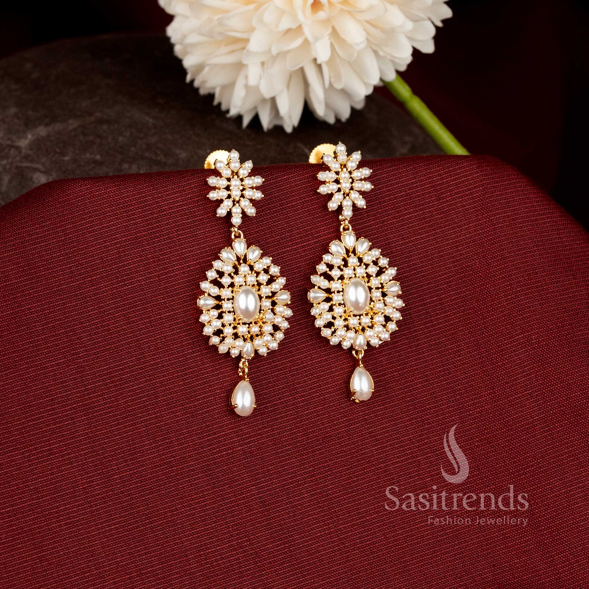 Traditional micro gold plated statement earrings showcasing a regal floral motif with premium craftsmanship and luxurious finish - Sasitrends.