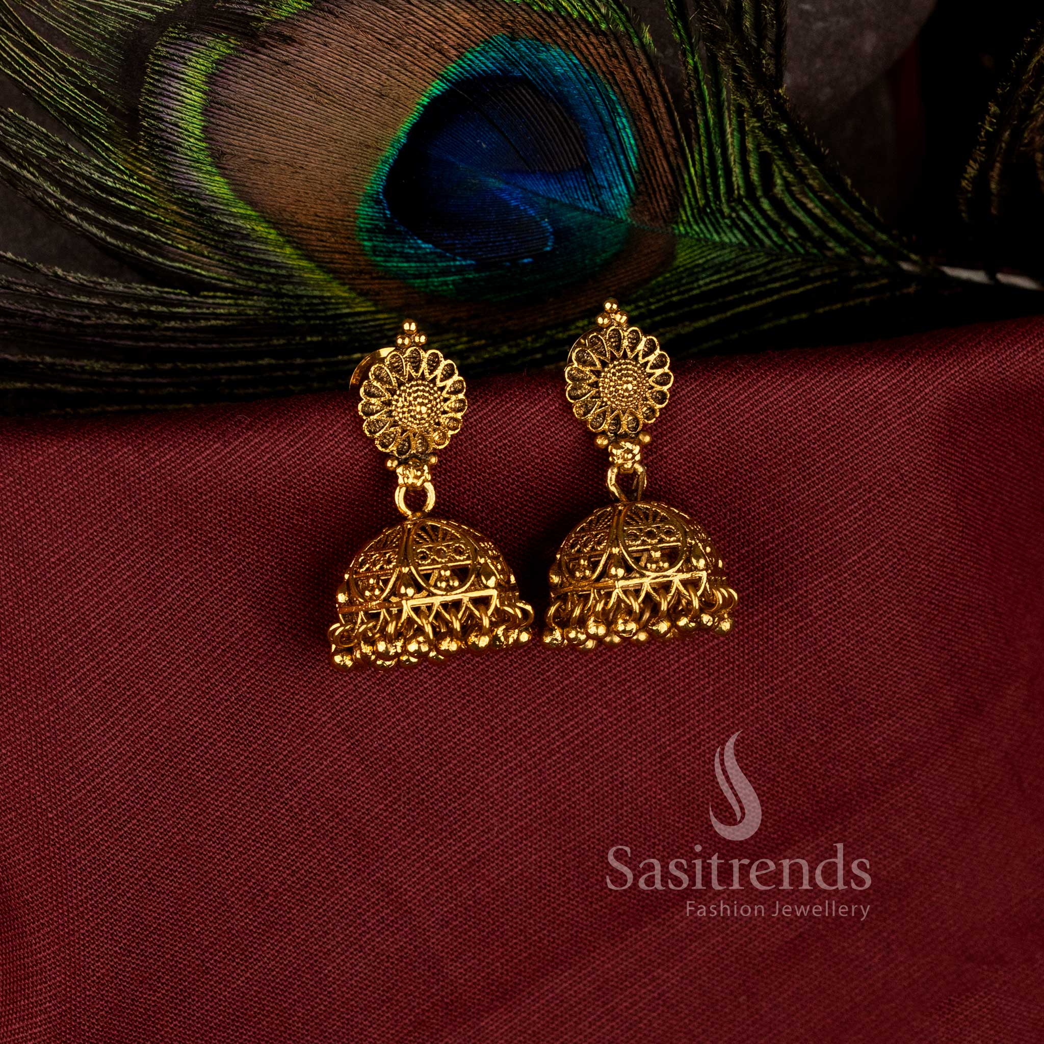 Festive wear sunflower disc jhumkas with intricate cutout craftsmanship - Sasitrends