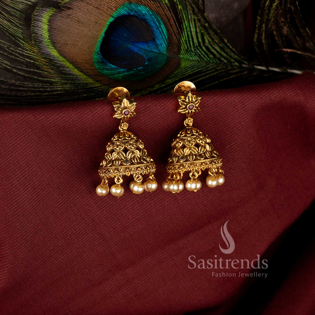 Heritage star motif floral matte gold plated jhumka earrings with hanging pearls - Sasitrends