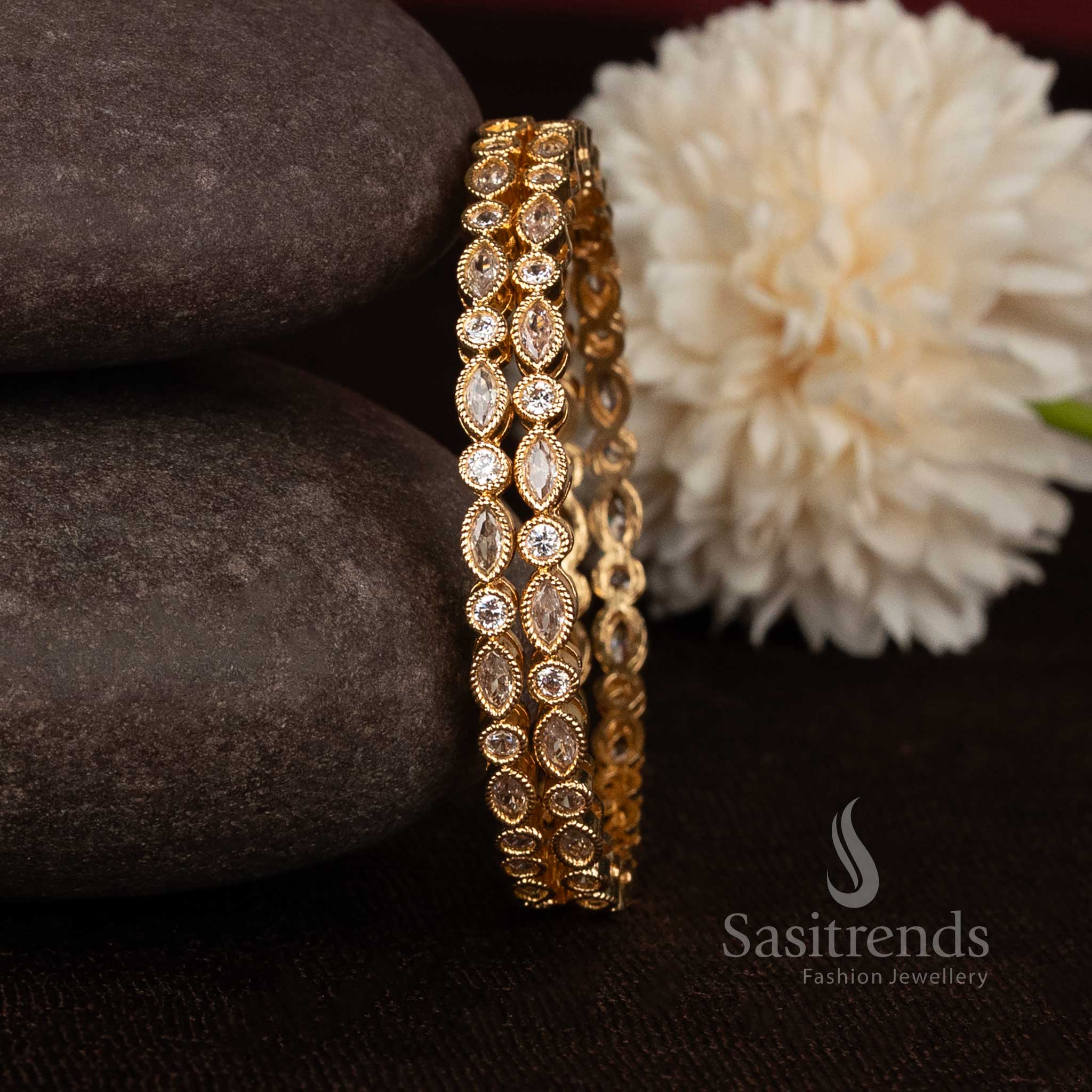 Micro gold plated leaf design bangles with american diamond stones for weddings - Sasitrends