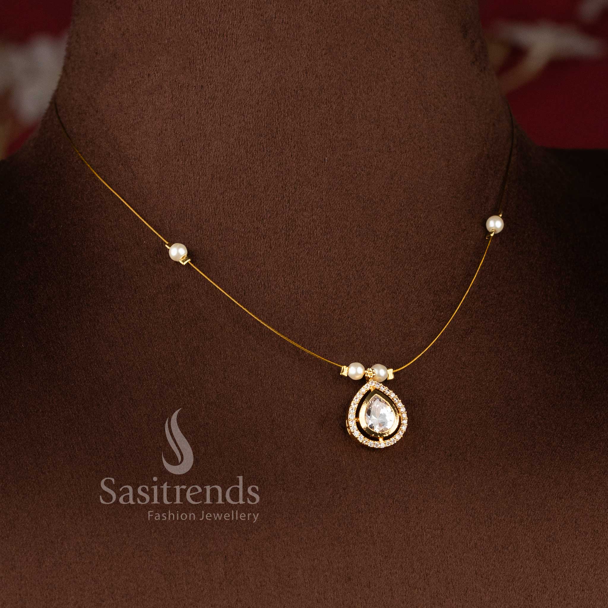 Elegant Invisible American Diamond 24K micro gold plated necklace set with pearl accent detailing - Sasitrends.