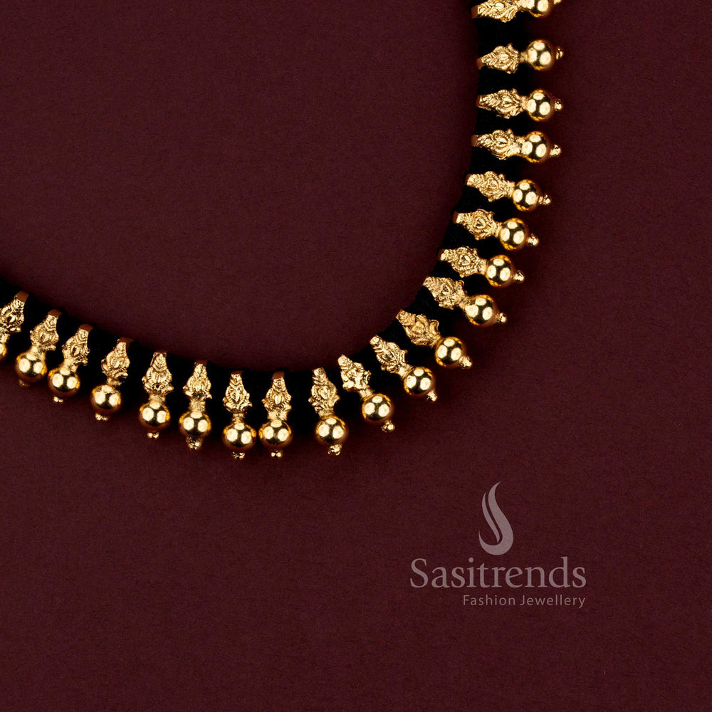 Grand festive wear matte gold plated black thread necklace set featuring refined bead patterns and premium design - Sasitrends.