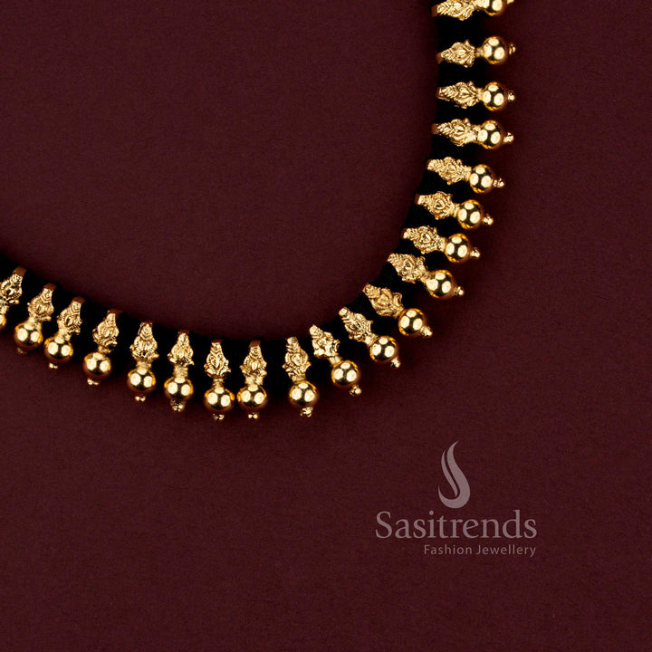 Grand festive wear matte gold plated black thread necklace set featuring refined bead patterns and premium design - Sasitrends.