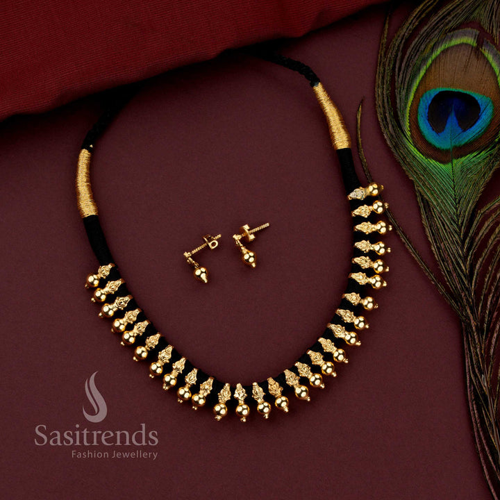 Grand festive wear matte gold plated black thread necklace set featuring refined bead patterns and premium design - Sasitrends.