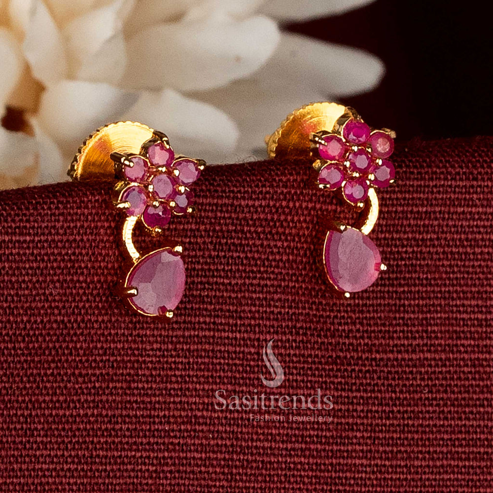 Sasitrends elegant micro gold plated ruby AD stone floral stud earrings featuring pearl cluster and suspended teardrop accent