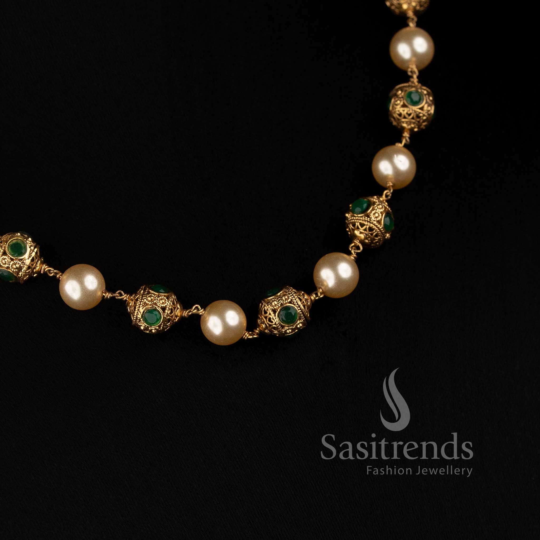 3026B traditional pearl bead necklace with antique gold plating and ornamental stone motifs