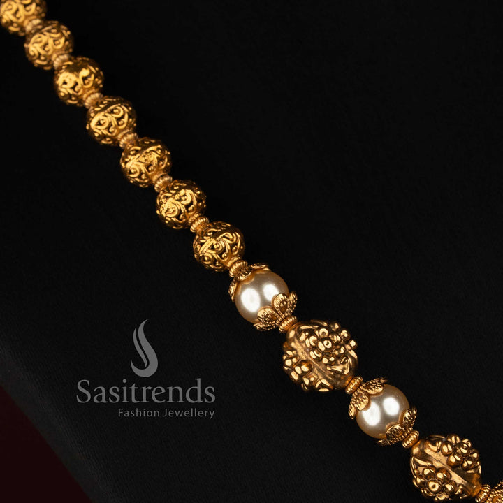 Detailed Pearl Necklace with Carved Filigree Balls and Textured Gold Bead Details - Sasitrends