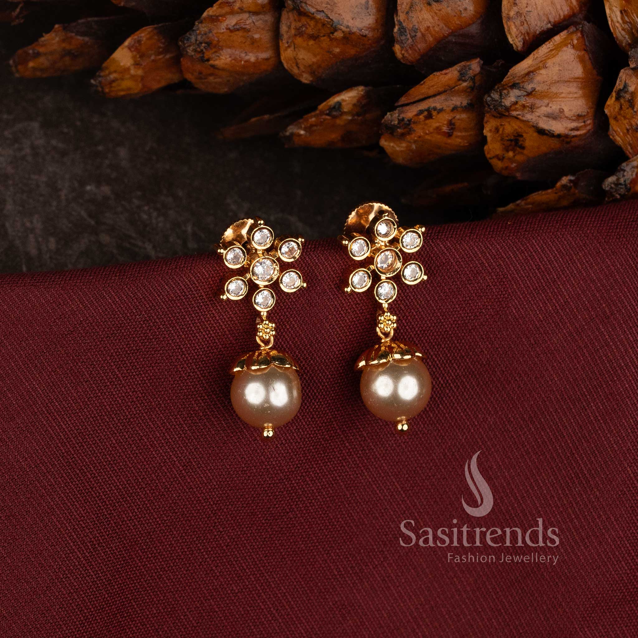 Micro Gold Plated Floral Stud Earrings with Sparkling AD Stones for Weddings and Festive Wear - Sasitrends
