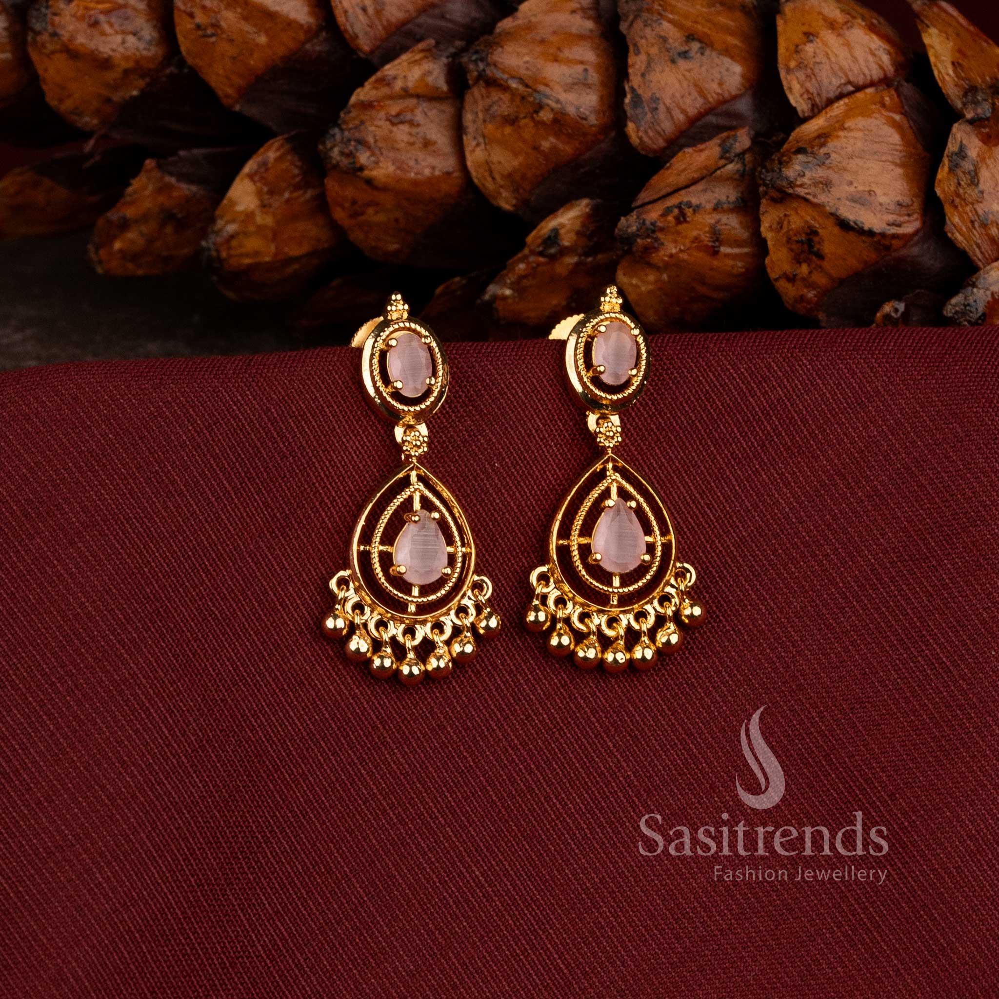 Stunning Micro Gold Plated Oval Stud and Pear-Cut AD Stone Earrings for Traditional and Party Wear - Sasitrends