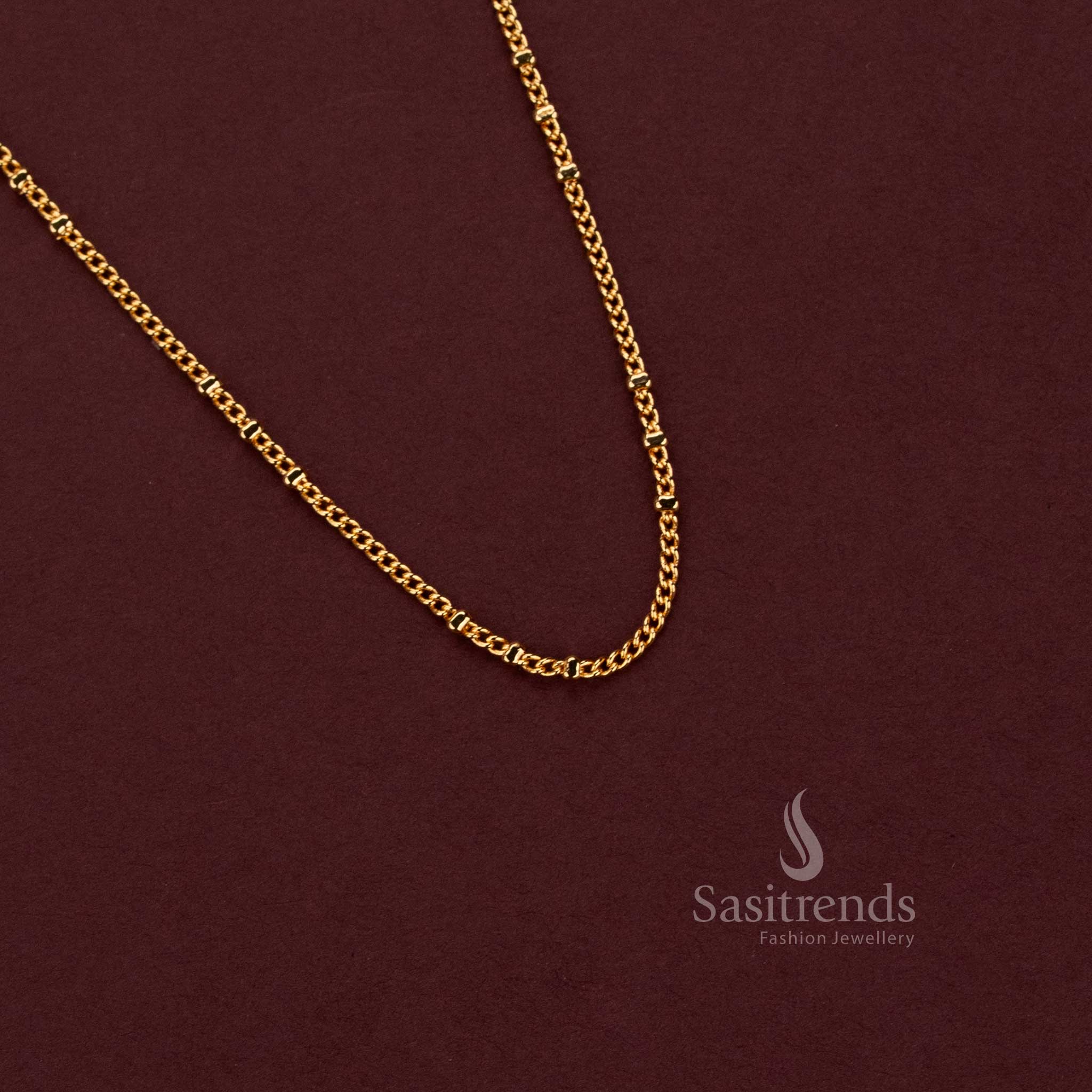 24K micro gold plated fine braided chain with tiny alternating diagonal golden links forming a continuous closely woven necklace pattern