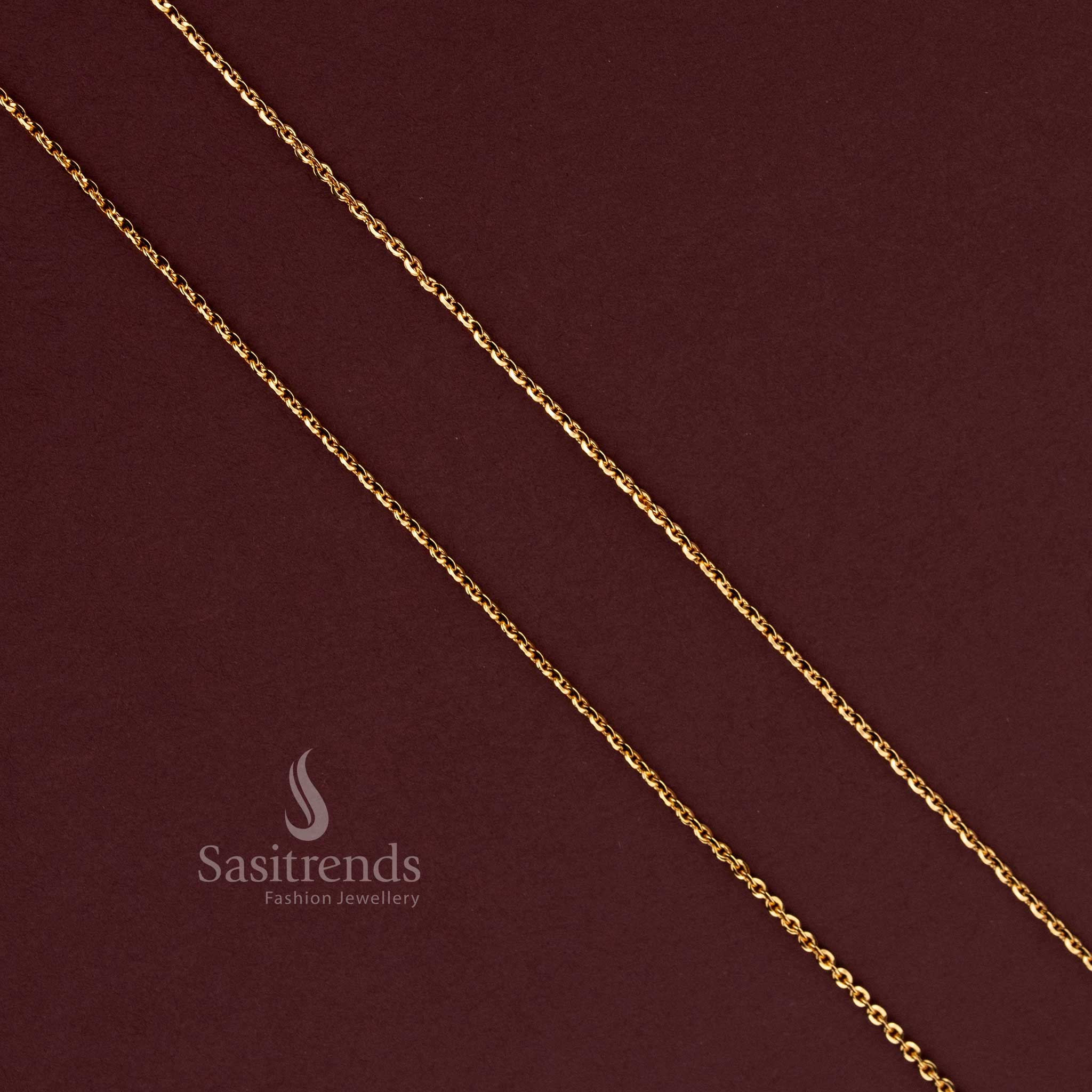 24K micro gold plated women's chain featuring a delicate double-row twisted-link pattern with closely connected golden loops and a small decorative heart-shaped tag near the clasp