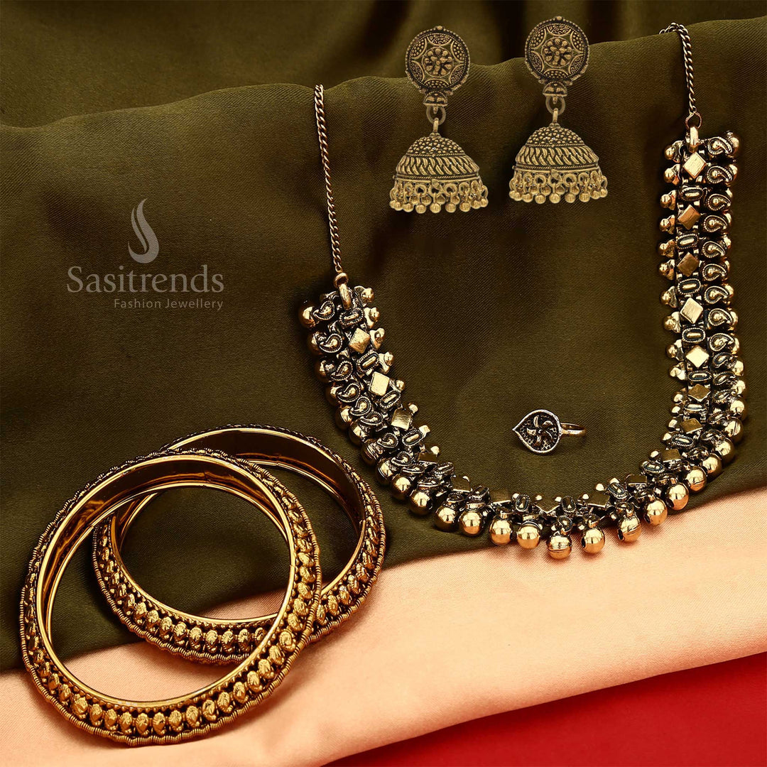Traditional oxidised antique gold jewellery set featuring a statement short necklace, complementing earrings, a graceful nosepin, and bold bangles – a vintage-inspired set ideal for bridal charm and folk cultural festivities – Sasitrends
