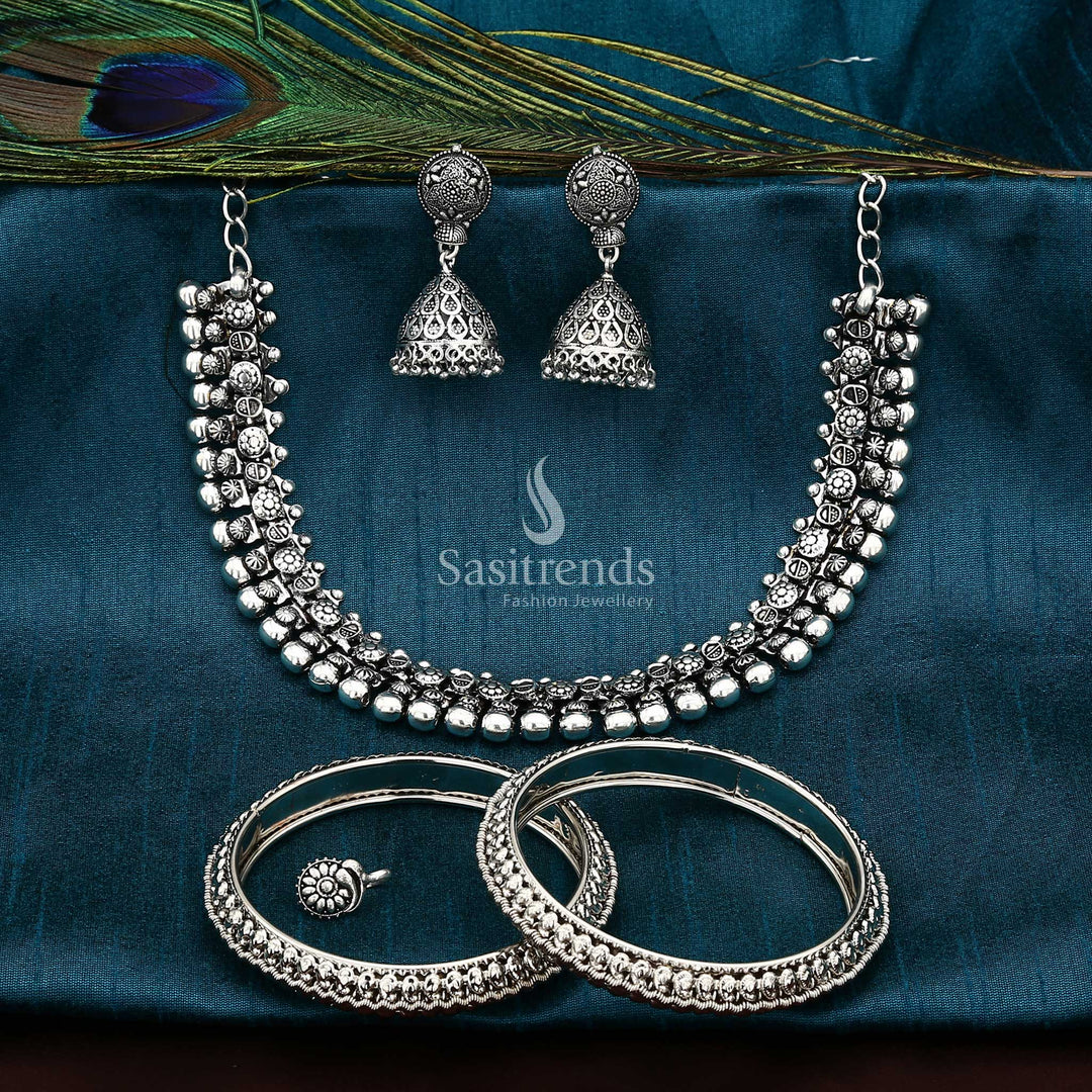 Designer oxidised silver haara jewellery set featuring mango motif bangles and a classic fusion choker design, creating a bold boho traditional vibe for festive wear – Sasitrends