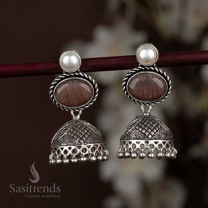 Oxidised Silver Jhumka Earrings With Brown Oval Stone And Rustic Pearl Hangings, A Subtle Yet Artistic Accessory For Earth-Toned Outfits – Sasitrends