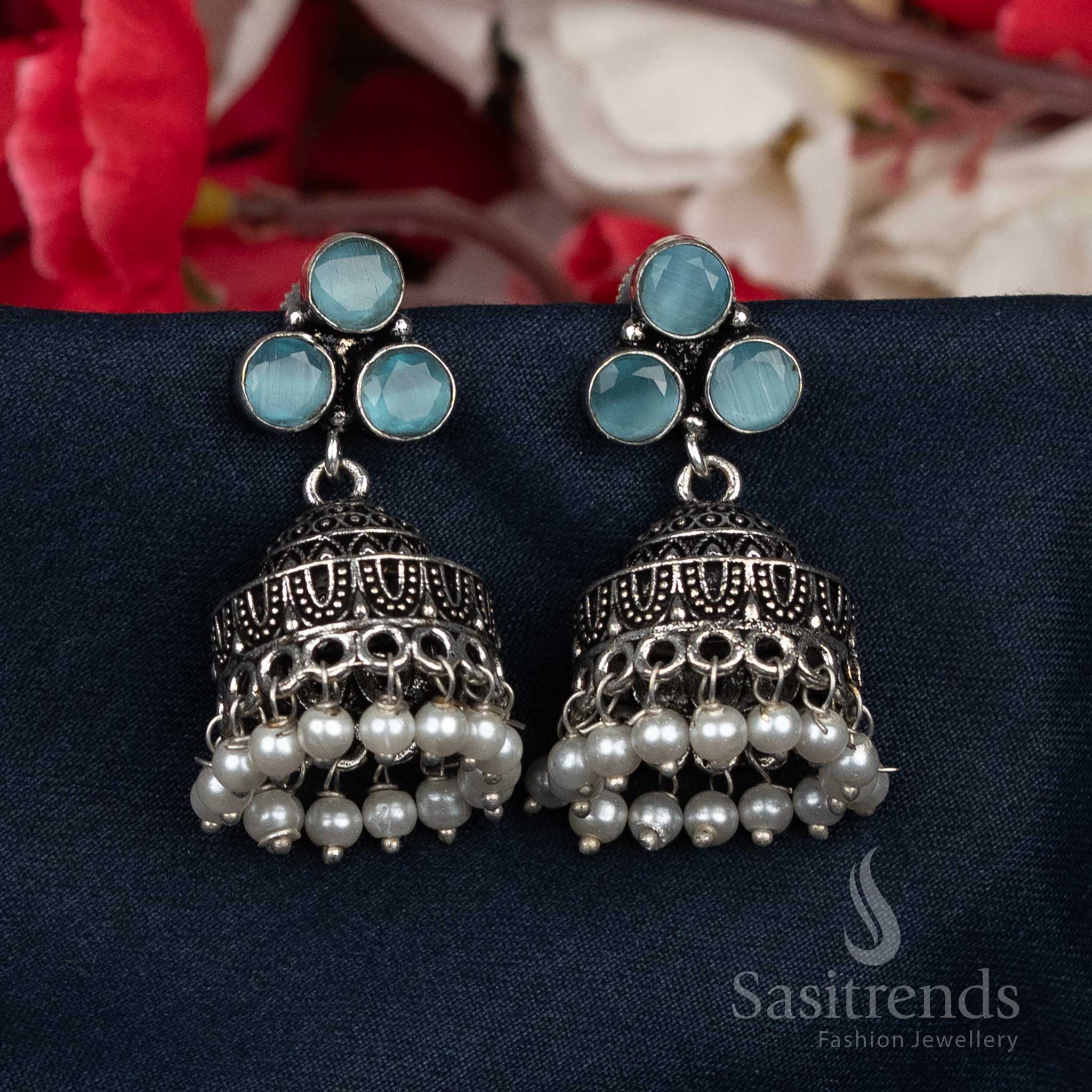Graceful oxidised mint green pearl bead cluster Jhumka earrings paired with shimmering stud tops – a luxury fusion of ethnic charm and modern finesse – Sasitrends