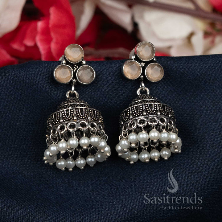 Vintage-inspired oxidised brown pearl bead cluster Jhumka earrings with shiny stone-studded tops – an exquisite traditional jewellery piece for poised women – Sasitrends