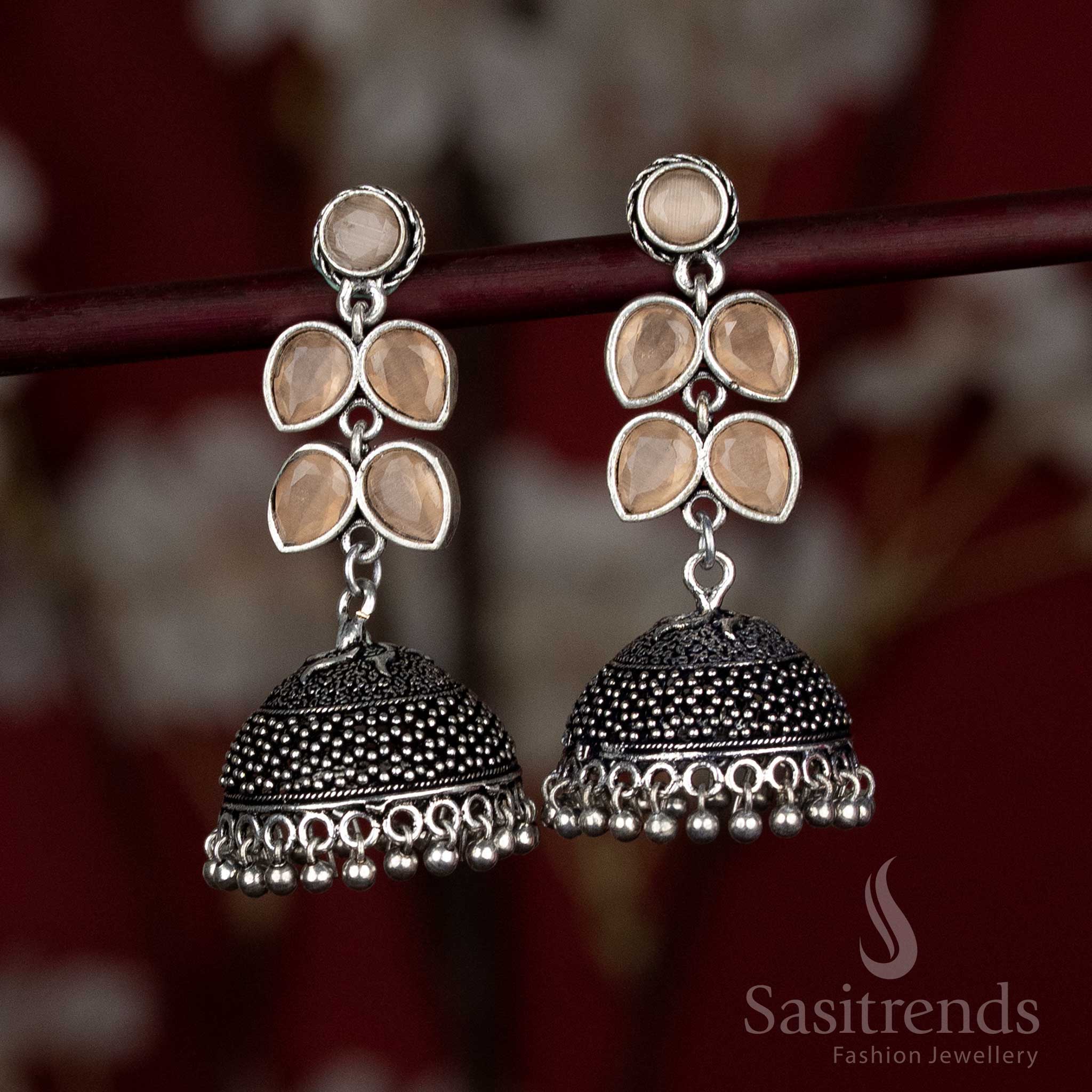 Rust-inspired brown dome-shaped jhumka earrings with vintage-style floral tops – perfect for homely Navaratri gatherings and rural-themed outfits – Sasitrends