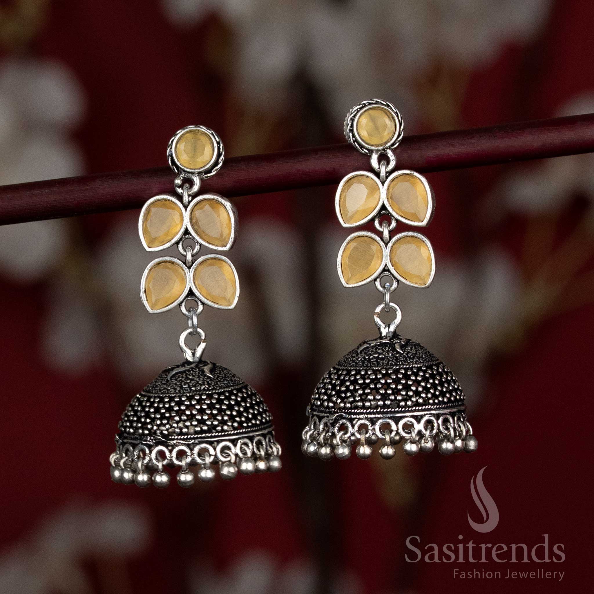 Sunny yellow oxidised jhumka earrings featuring floral design – styled for Navaratri rituals, cotton tunics, and easy-flowing skirts – Sasitrends