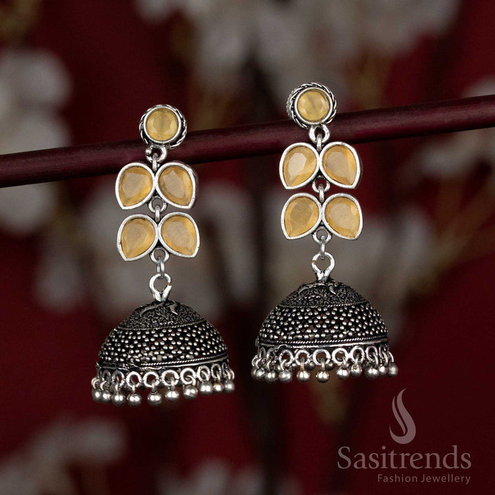 Sunny yellow oxidised jhumka earrings featuring floral design – styled for Navaratri rituals, cotton tunics, and easy-flowing skirts – Sasitrends