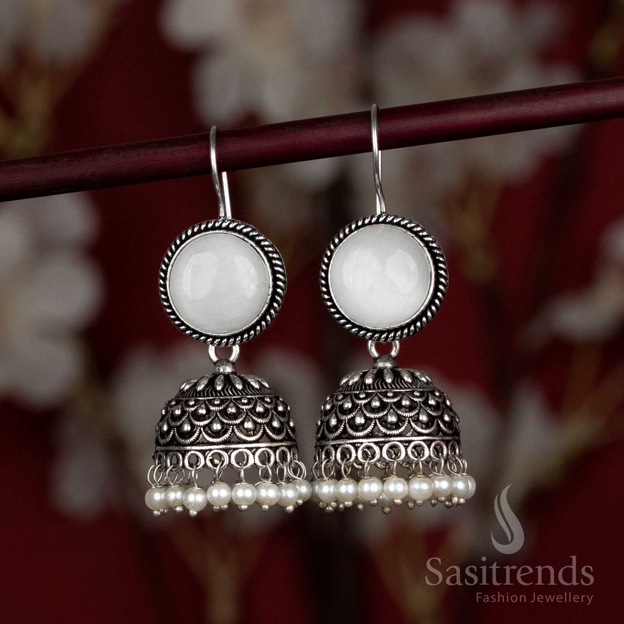 Graceful white oxidised jhumka earrings with natural stone stud and elegant pearl drop – a subtle choice for Navaratri puja mornings and saree-draped events – Sasitrends