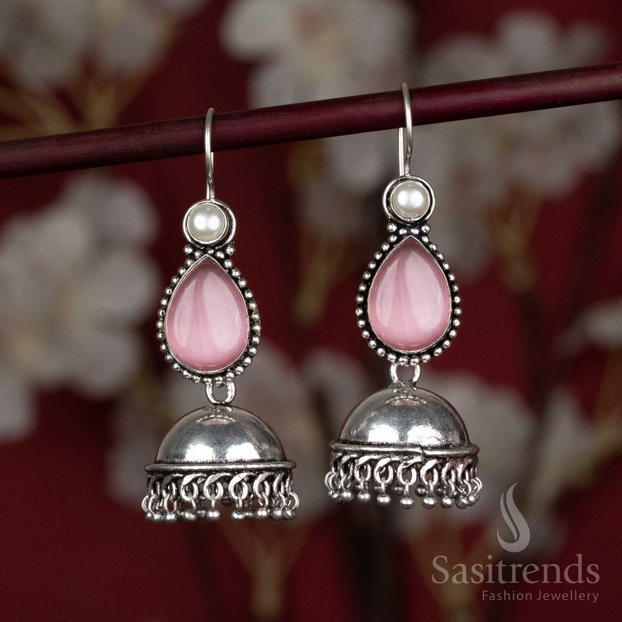 Rosy pink oxidised dome jhumkas with natural stone accent – made for Navaratri dandiya circles and light flared lehengas – Sasitrends