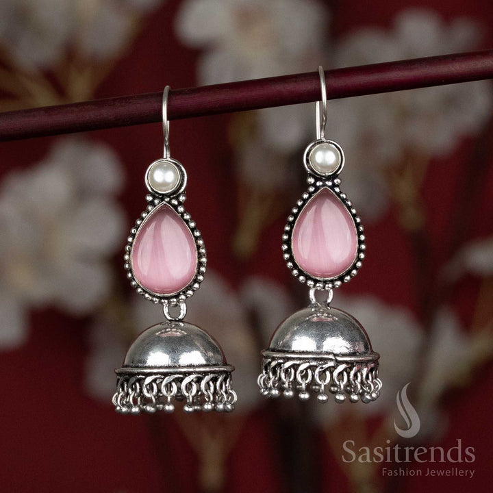 Rosy pink oxidised dome jhumkas with natural stone accent – made for Navaratri dandiya circles and light flared lehengas – Sasitrends