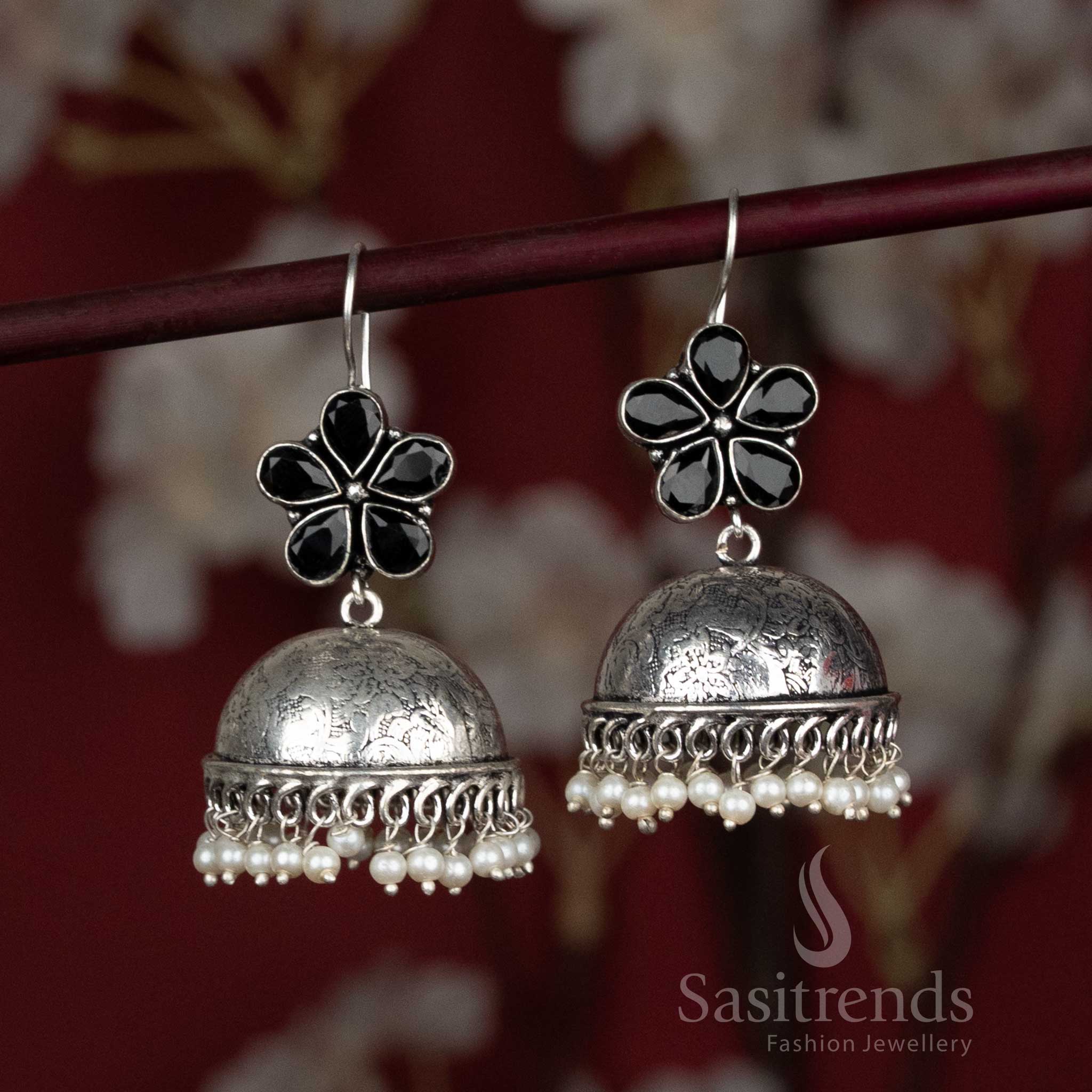 Bold black dome jhumka earrings with floral stone detailing and pearl beaded fringe – a powerful style for Navaratri melas and cotton dupatta pairings – Sasitrends