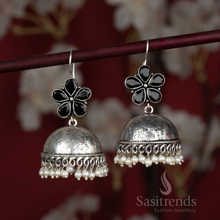 Bold black dome jhumka earrings with floral stone detailing and pearl beaded fringe – a powerful style for Navaratri melas and cotton dupatta pairings – Sasitrends