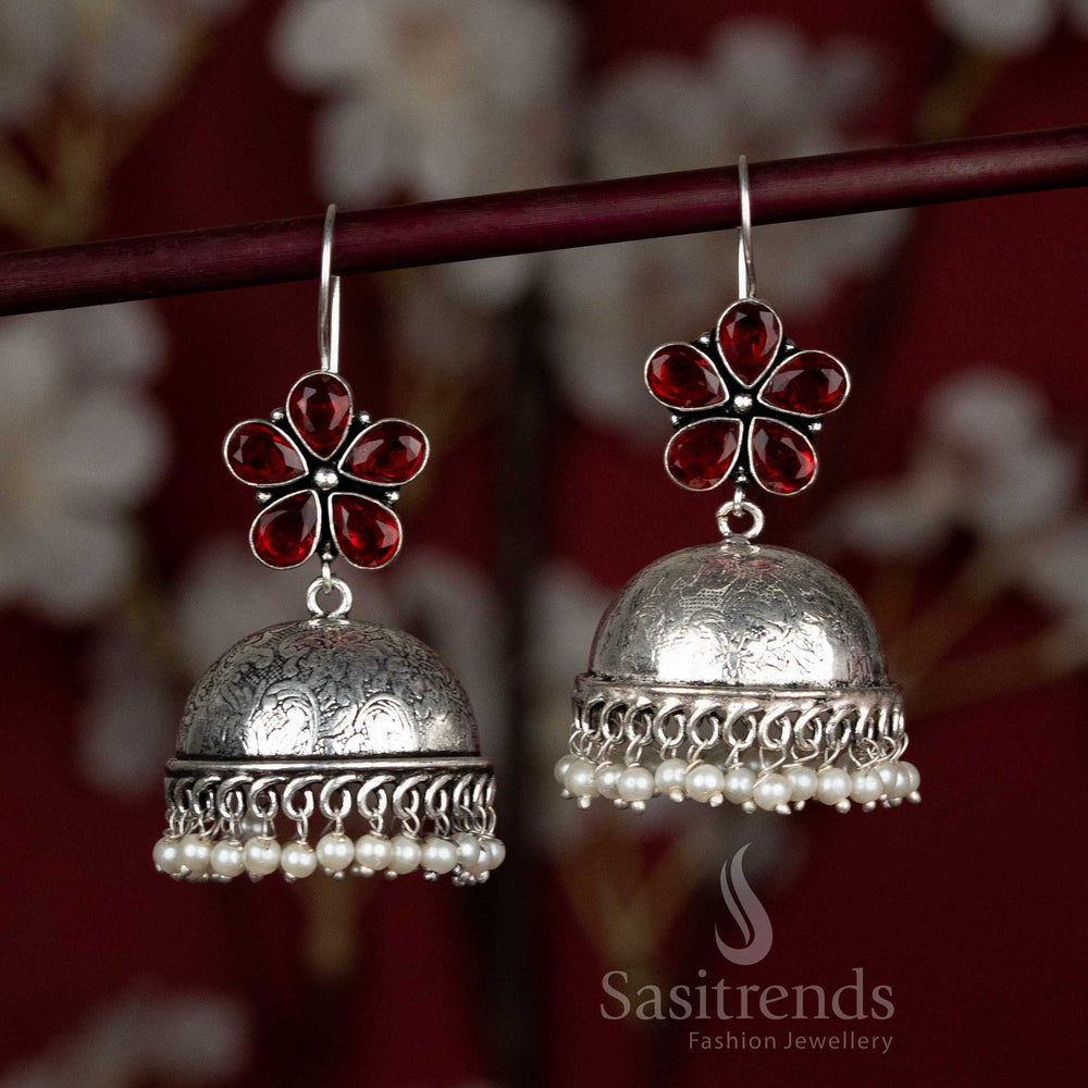 Fiery red oxidised dome earrings with detailed floral stone top and pearl drops – designed for Navaratri night dance rounds and vivid blouse pairings – Sasitrends