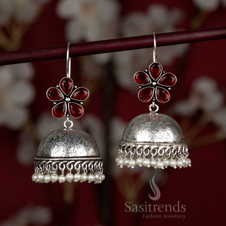 Fiery red oxidised dome earrings with detailed floral stone top and pearl drops – designed for Navaratri night dance rounds and vivid blouse pairings – Sasitrends