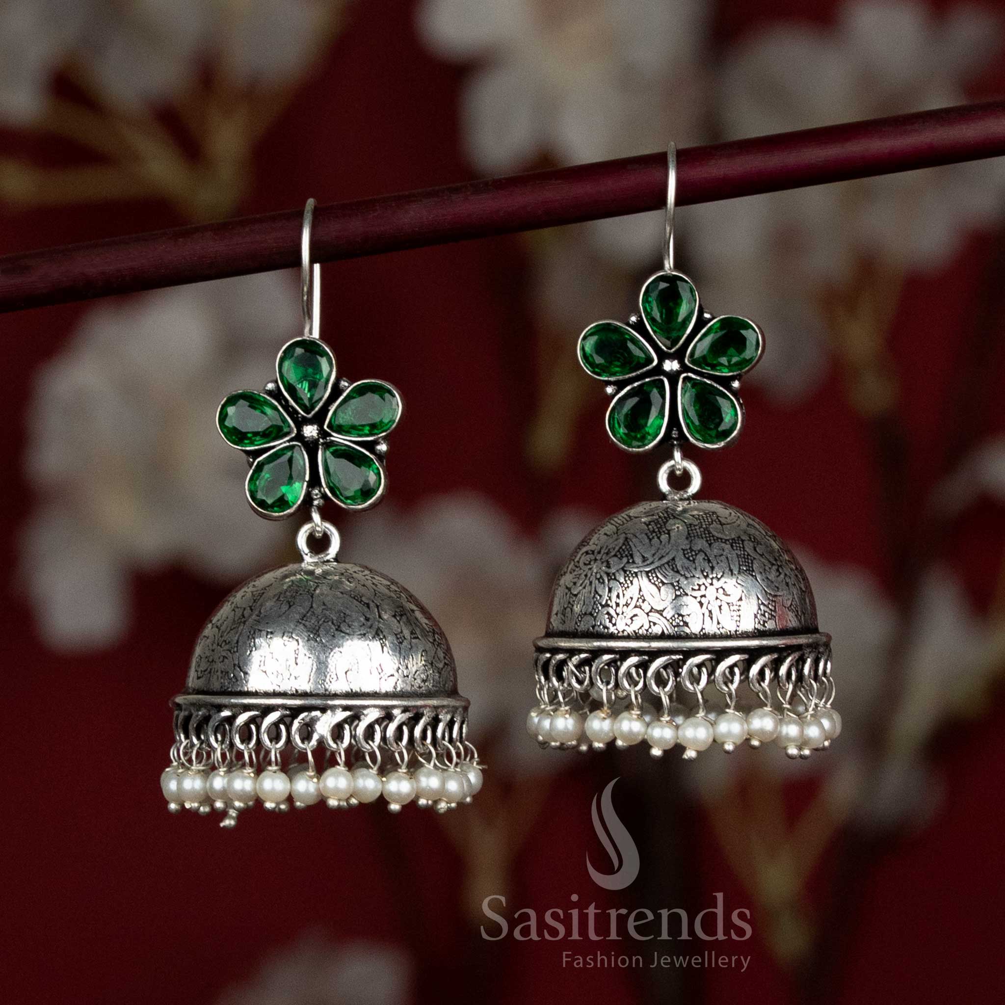 Radiant green oxidised dome jhumka earrings with teardrop floral top and pearl accents – perfect for Navaratri lehenga gatherings and folk festivities – Sasitrends
