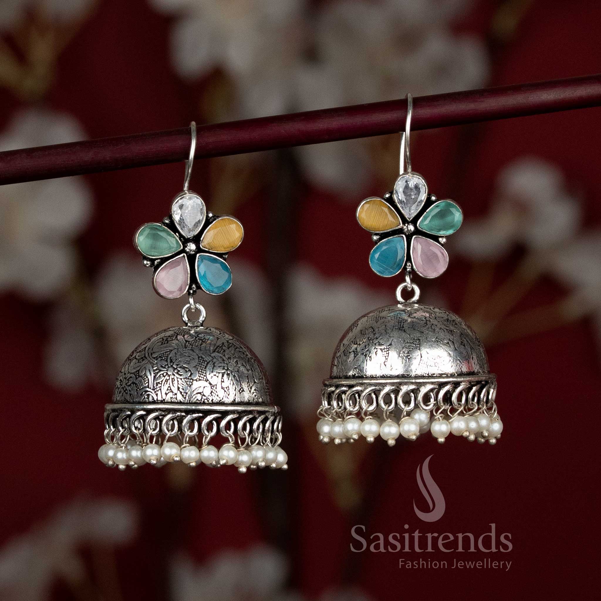 Vibrant multi-stone oxidised dome jhumkas with floral top and pearl bead fringe – perfect for colourful Navaratri fusion wear and mirror-work ensembles – Sasitrends