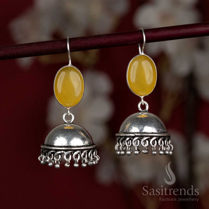 Bright yellow oxidised earrings with shining oval centre and silver danglers – ideal for energetic Navaratri daytime dancing looks – Sasitrends