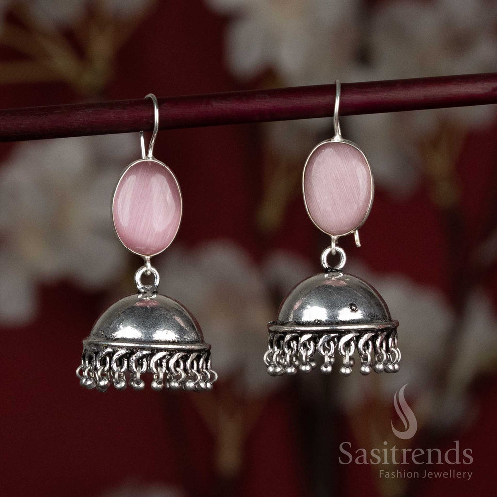 Chic pink oxidised jhumka earrings with eye-catching oval stone and dangling silver beads – best for Navaratri fusion lehengas and festive gatherings – Sasitrends