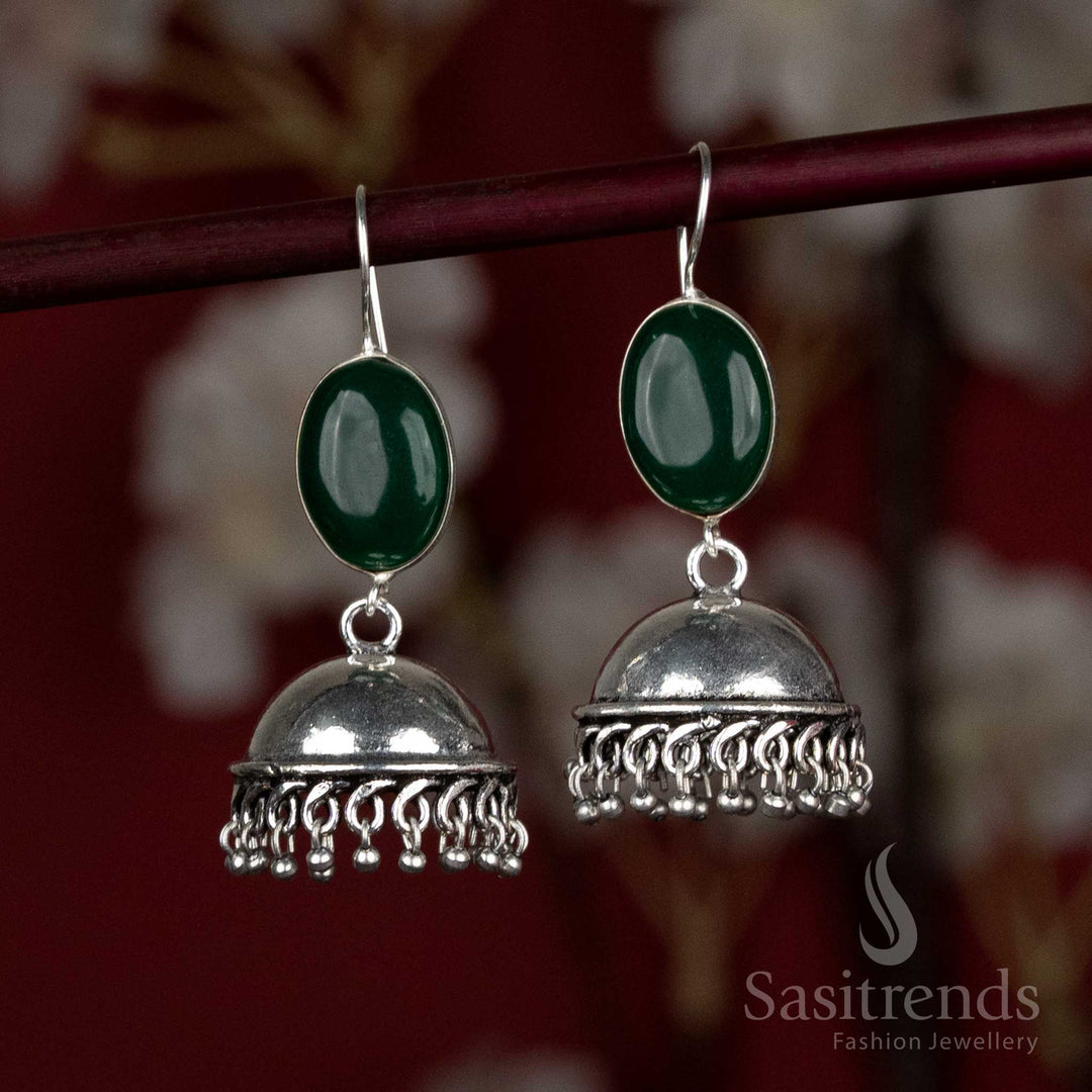 Graceful green oxidised dome earrings with a polished oval stone and fine silver fringe – perfect for cultural Navaratri dances and saree pairings – Sasitrends