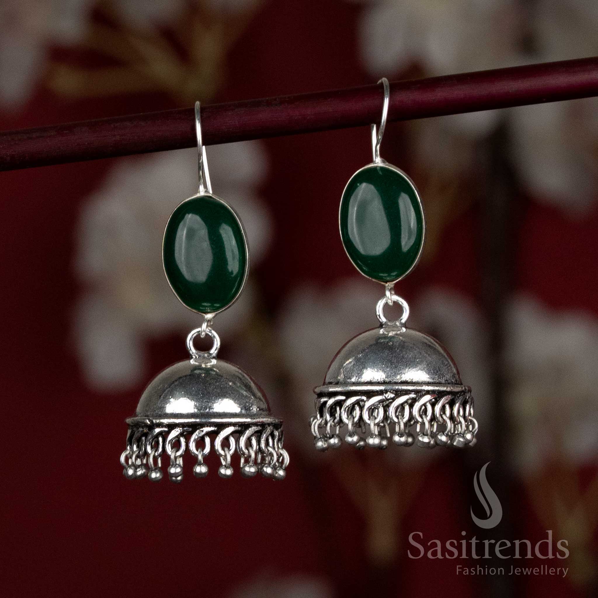 Graceful green oxidised dome earrings with a polished oval stone and fine silver fringe – perfect for cultural Navaratri dances and saree pairings – Sasitrends