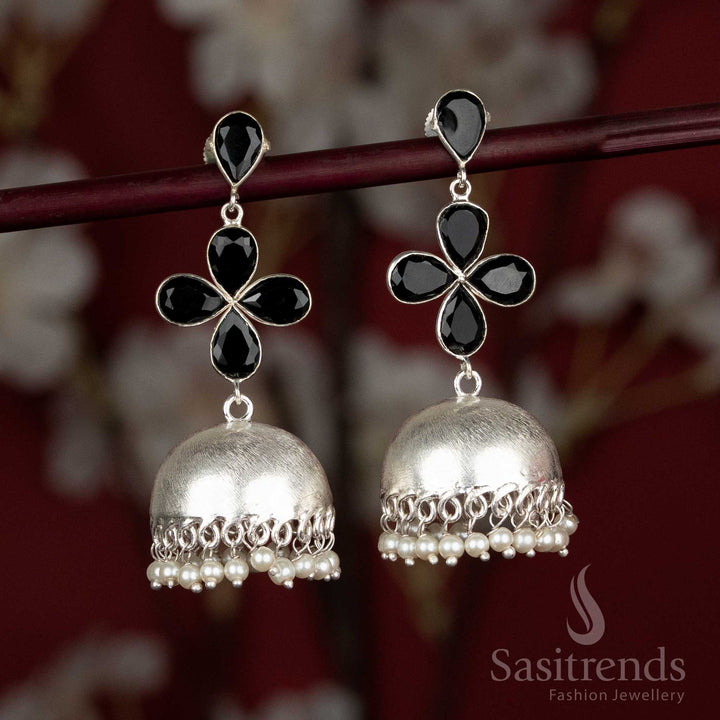 Black oxidised jhumka earrings with four-petal top and pearl drops – great match for Navaratri wear and subtle workwear looks – Sasitrends